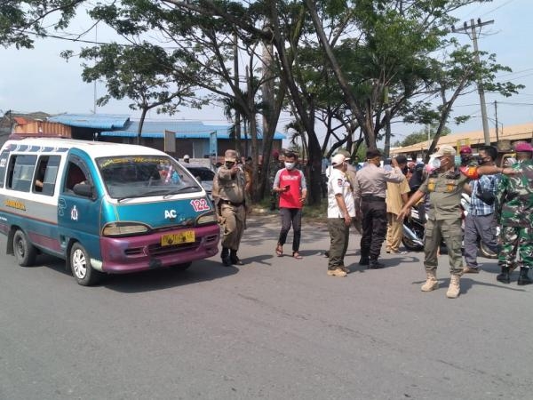 Gugus Tugas Covid-19 Gelar Sosialisasi dan Penindakan di Belawan